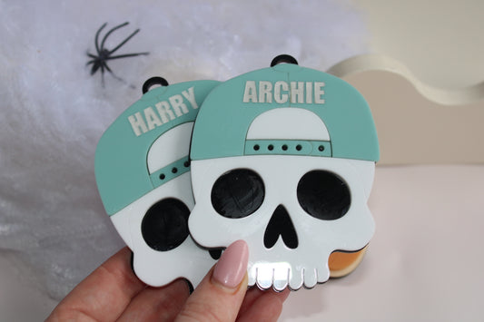 Snap back skull Halloween basket tag