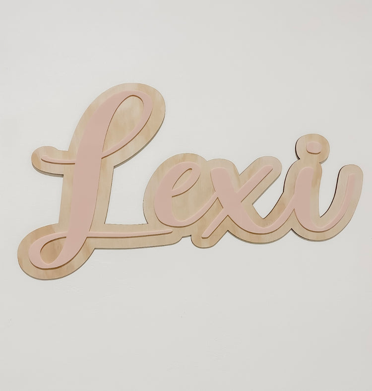 Layered wood and acrylic script