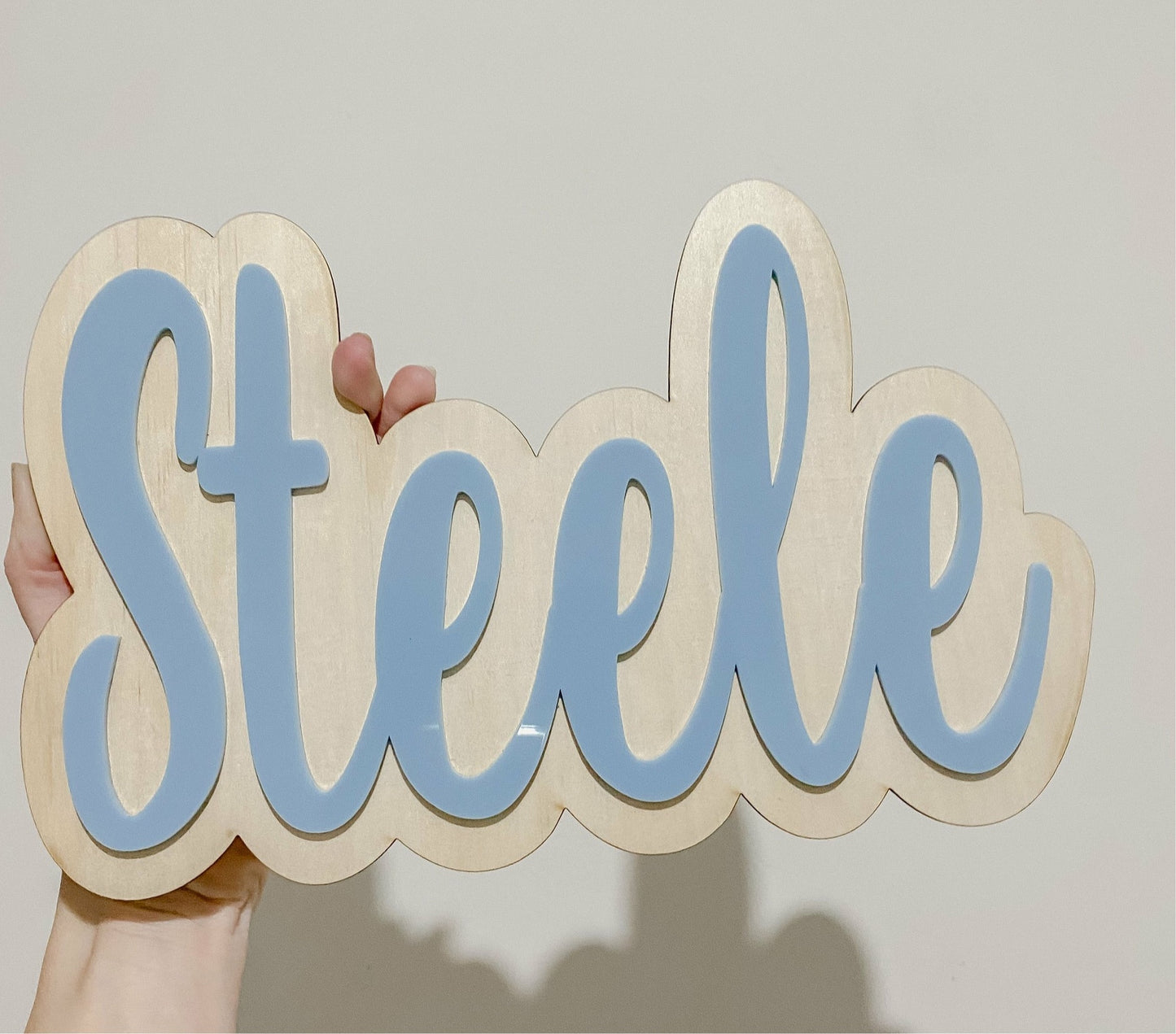 Layered wood and acrylic script